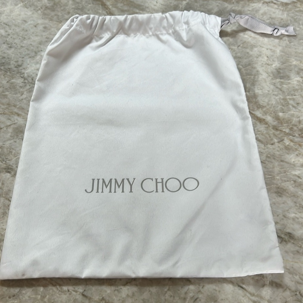 Jimmy Choo dust cover.